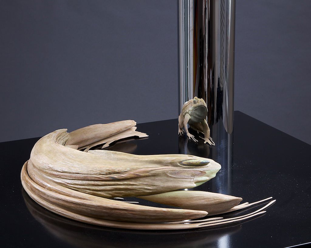 Anamorphic frog sculpture